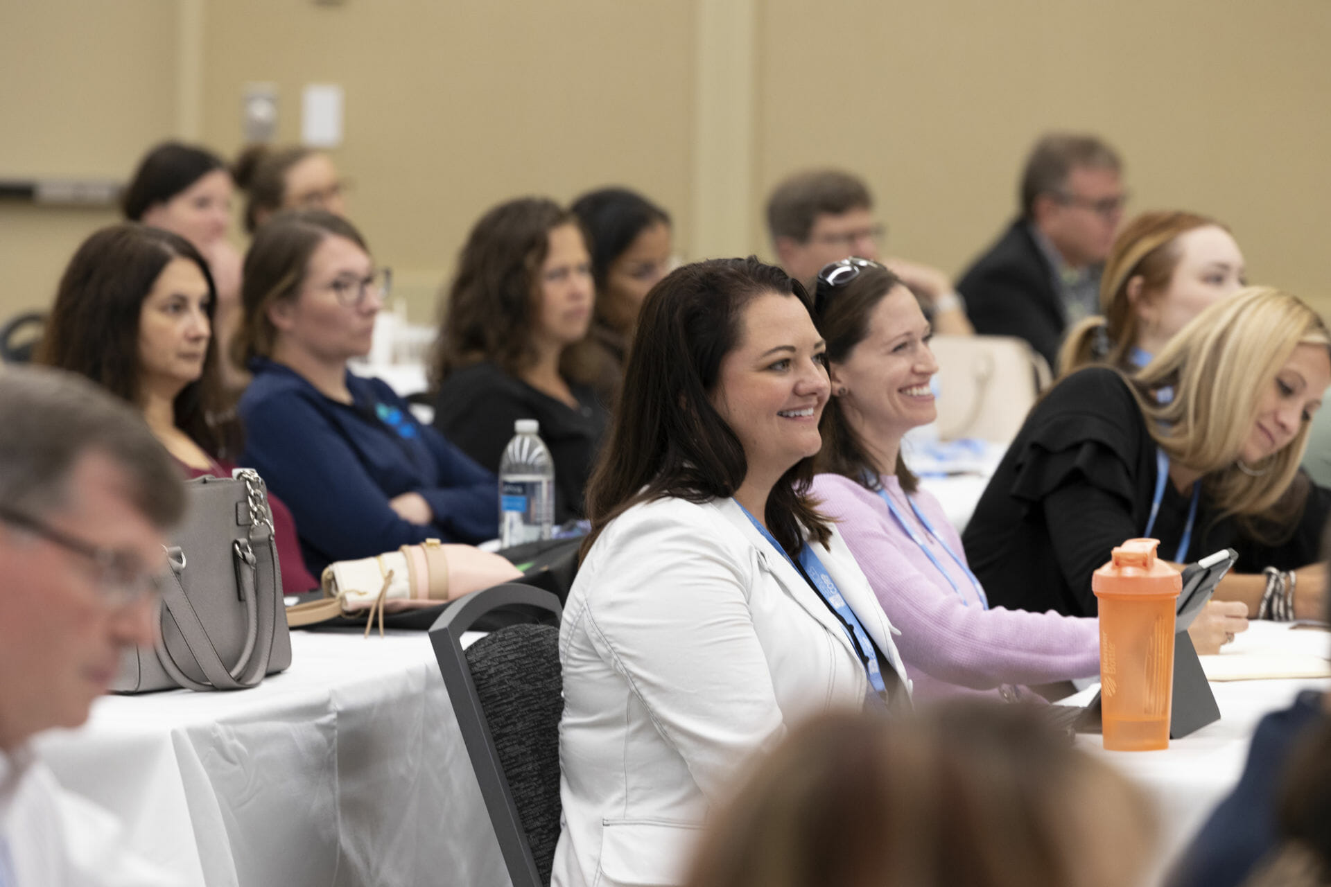 Woman smiling at Annual Session