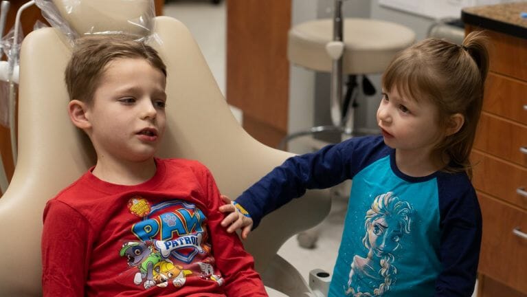 brother and sister at dentist