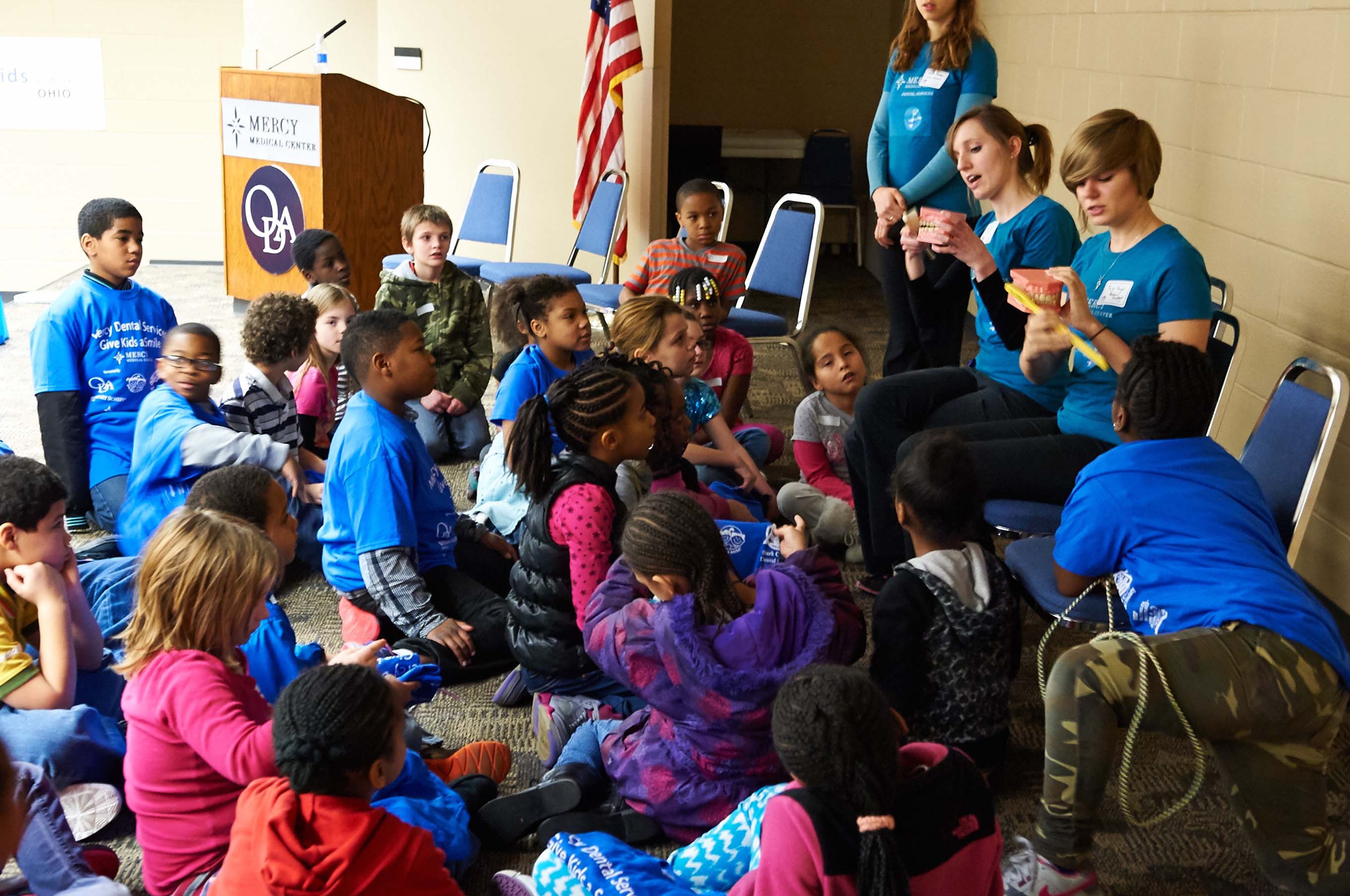 Children receive oral health care instruction