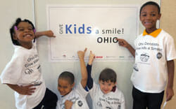 Kids at the 2014 Give Kids a Smile kick-off event