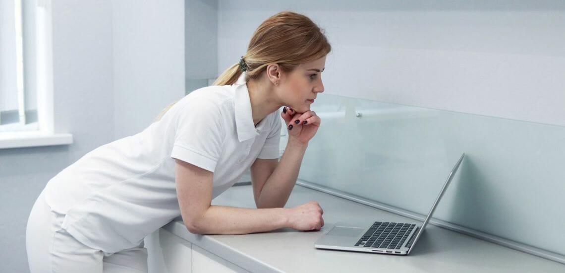 nurse on computer